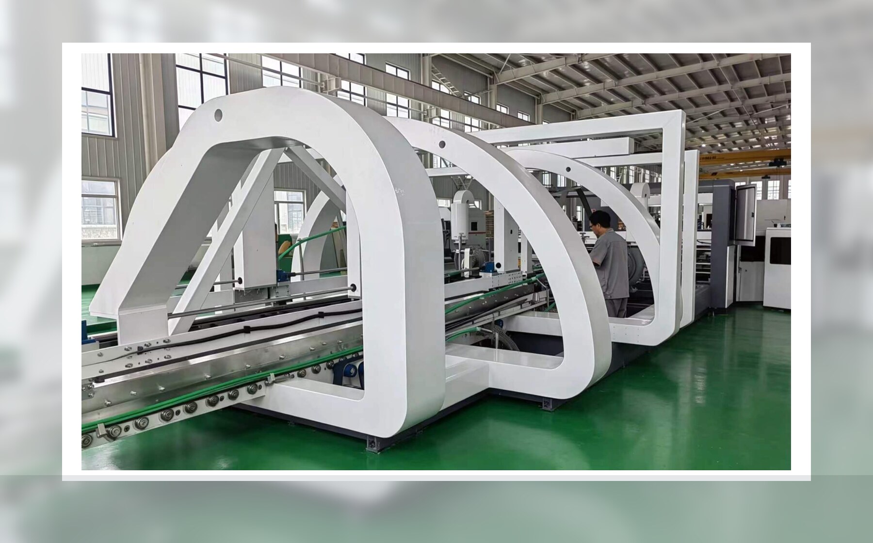 Carton folder gluer and stitcher line in workshop