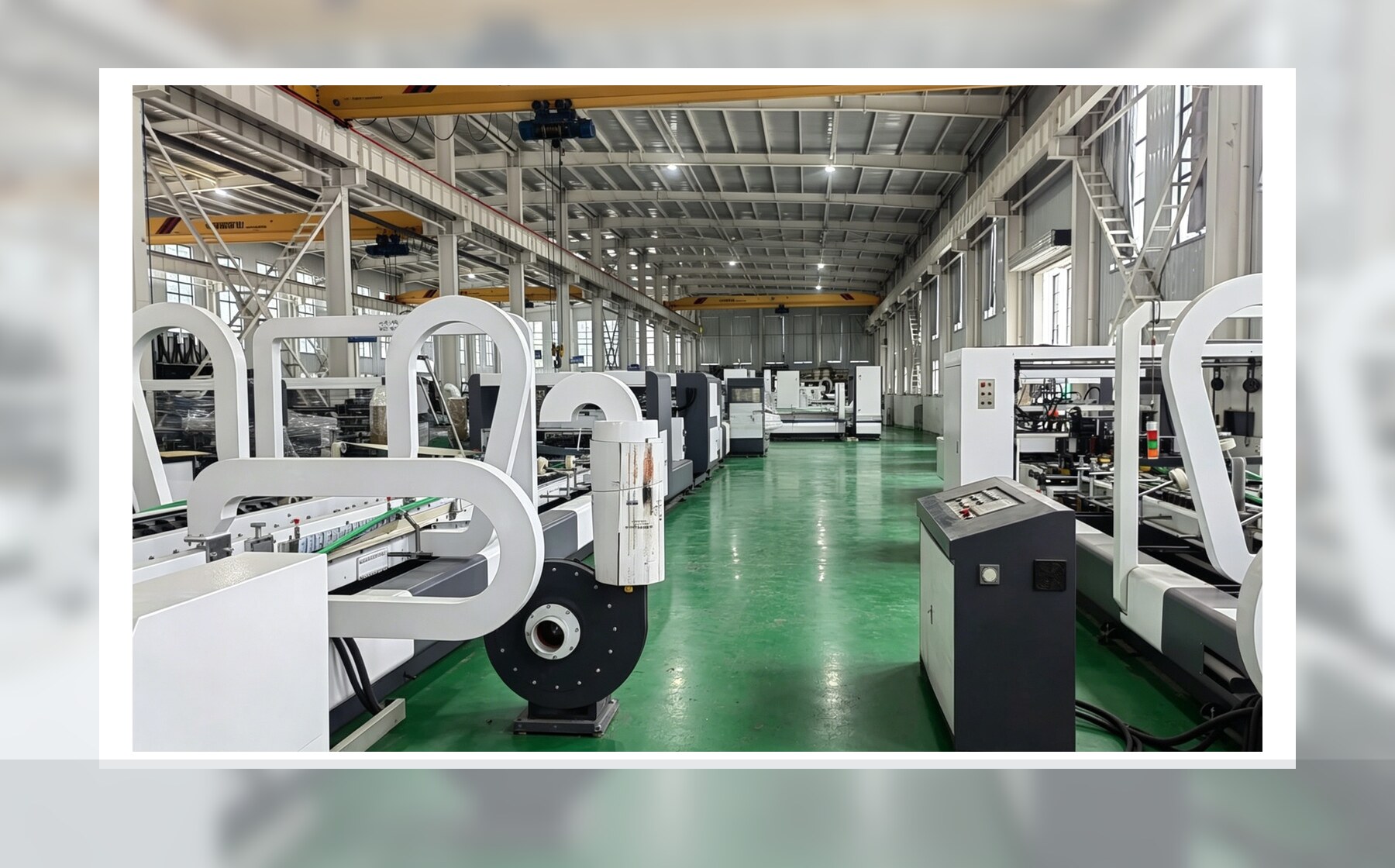 Corrugated carton machinery workshop with connected production lines