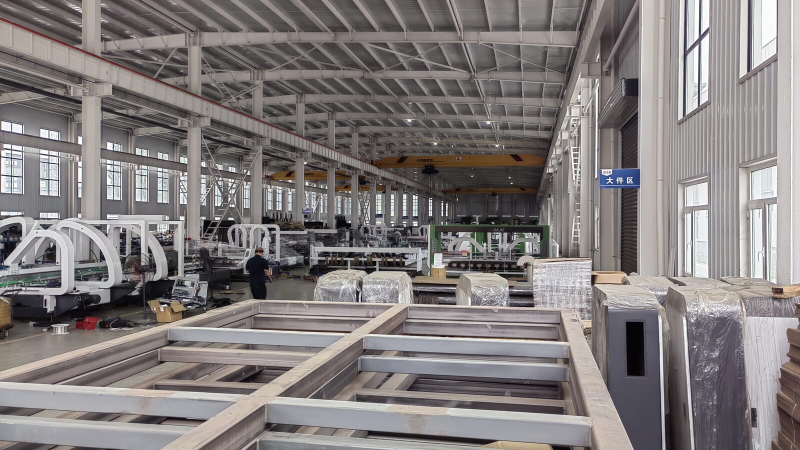 Packaging machinery workshop with carton production equipment